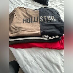 5 Hollister long-sleeve shirts.